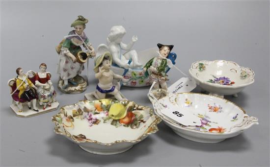 A small late Meissen model of a winged putti with tricorn hat, a similar hurdy-gurdy player and sundry ceramics